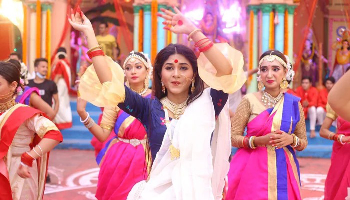 পূজার গানে স্পর্শিয়া
