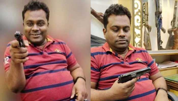 পিস্তল হাতে মৎস্যজীবী লীগ নেতার ছবি ভাইরাল