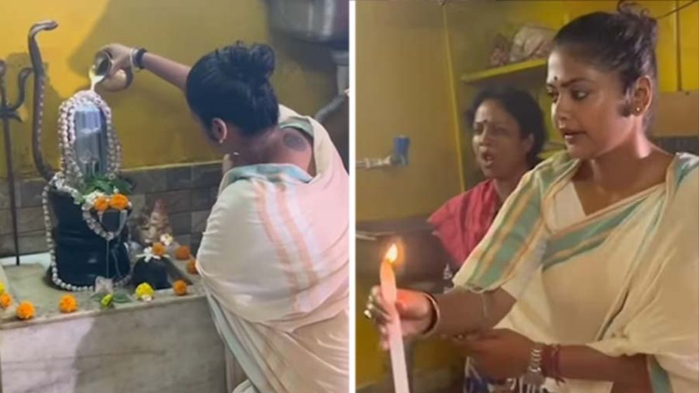 ভোট কেন্দ্রে পুজা করছেন সায়নী