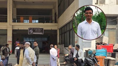 নওগাঁয় হাসপাতালের সামনেই রাজস্ব কর্মকর্তার ক্ষতবিক্ষত মরদেহ