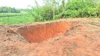 রাতের আঁধারে শতবর্ষী কবরস্থানের মাটি লুট